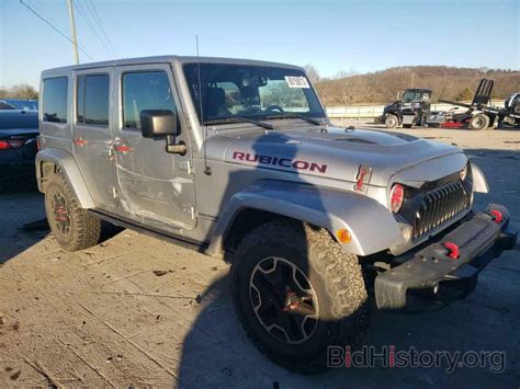 Report 1C4HJWFG8FL761311 JEEP WRANGLER 2015 SILVER FLEXIBLE FUEL