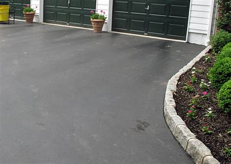 Asphalt Driveway Edging With Cobblestone Pavers