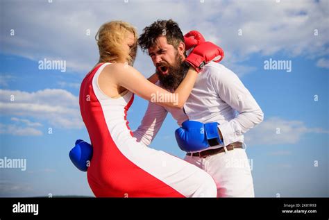 Learn How To Defend Yourself Man And Woman Boxing Gloves Fight Blue