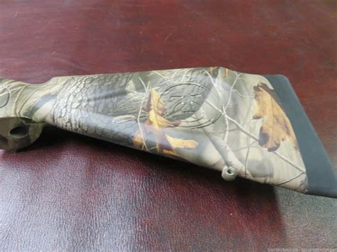 Thompson Center Impact 50 Caliber Muzzleloader Realtree Hardwoods Camo Black Powder Rifles