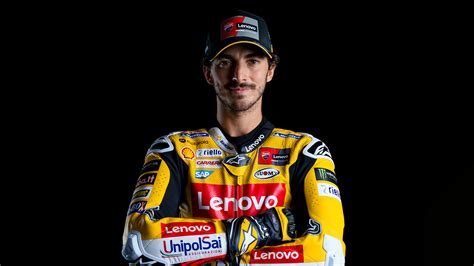 The Ducati Lenovo Team And The World Champion Francesco Bagnaia In