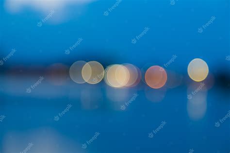 Premium Photo | Bokeh lights on blue background