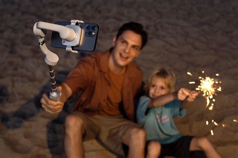 New Dji Om 5 Gimbal Has A Built In Selfie Stick