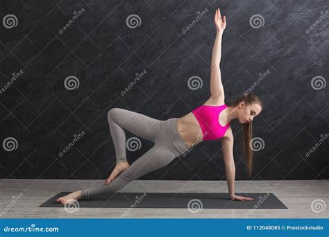 Woman Training Yoga in Side Plank Pose. Stock Image - Image of morning ...