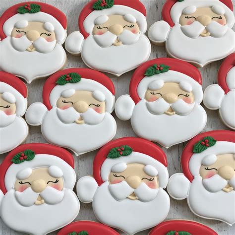 Decorated Santa Sugar Cookies Are Perfect For Christmas Christmas Cookies Decorated Cookie