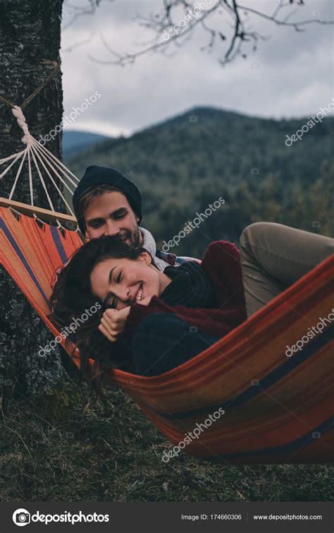 Couple In Love Relaxing Hammock Stock Photo By ©gstockstudio 174660306