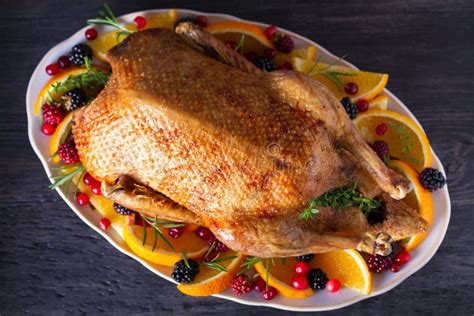 Whole Roasted Duck With Oranges Berries And Herbs Christmas