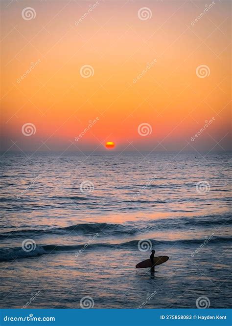 Silhouette of a Surfer in the Ocean Sunset Stock Image - Image of ...