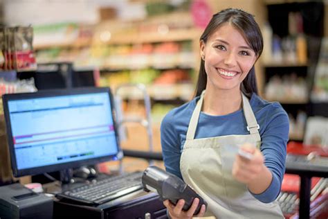 royalty  cashier pictures images  stock  istock