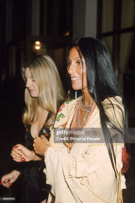 American Singer And Actress Cher Stands In A Native American Poncho