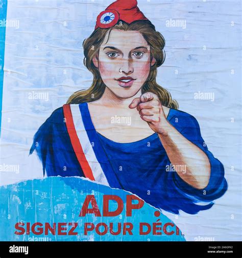 A Marianne with an outstretched finger, Left wing political poster, Lyon, France Stock Photo - Alamy