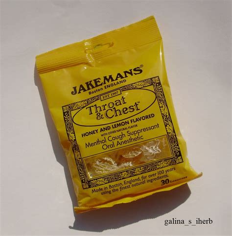 A Bag Of Jalehans Sitting On Top Of A White Table Next To A Cup