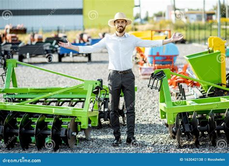 Salesman Or Farmer At The Agricultural Shop Stock Photo Image Of