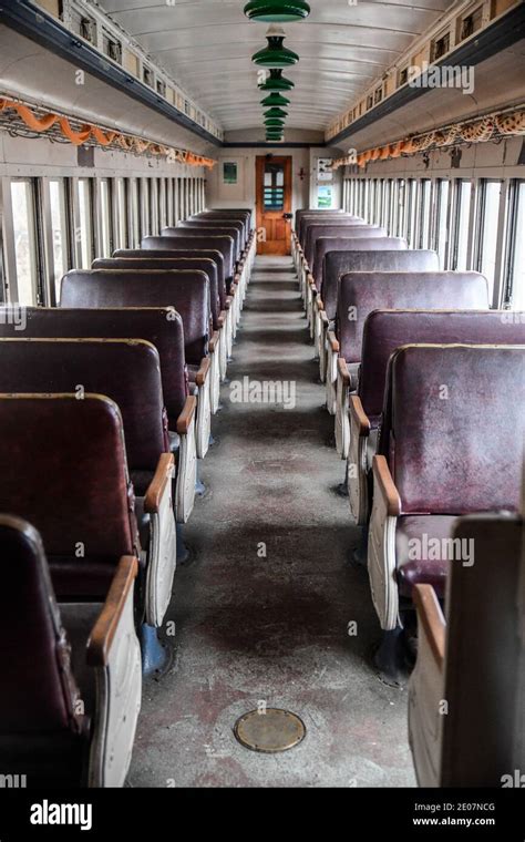 Vintage and abandoned empty railroad train car on the train tracks ...