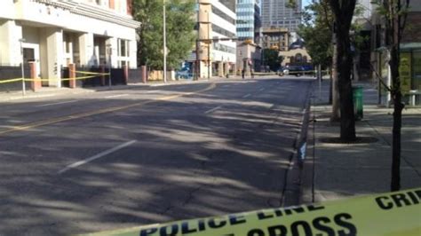 Police Deeply Concerned After Bystander Shot Dead Downtown Cbc News