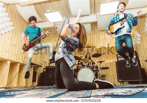 Music Band Having Fun Performing On Stock Photo Edit Now 1192425658