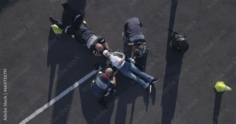 Emergency Injury And Aerial Of People On Road For Accident First Aid