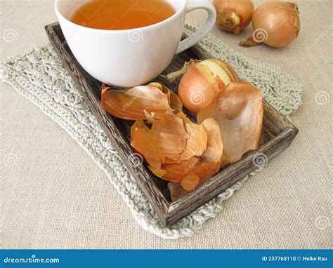 A cup of onion peel tea stock photo. Image of defense - 237768110