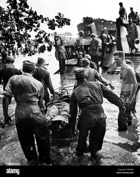 WORLD WAR II: MOROTAI. /nAmerican soldier (probably a marine) hit by a ...