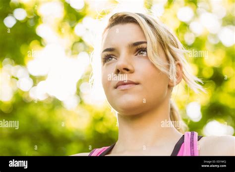Fit Blonde Standing In The Park Stock Photo Alamy