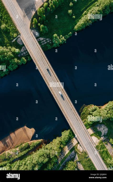 Drone top down view of empty car bridge crossing beautiful dark blue ...