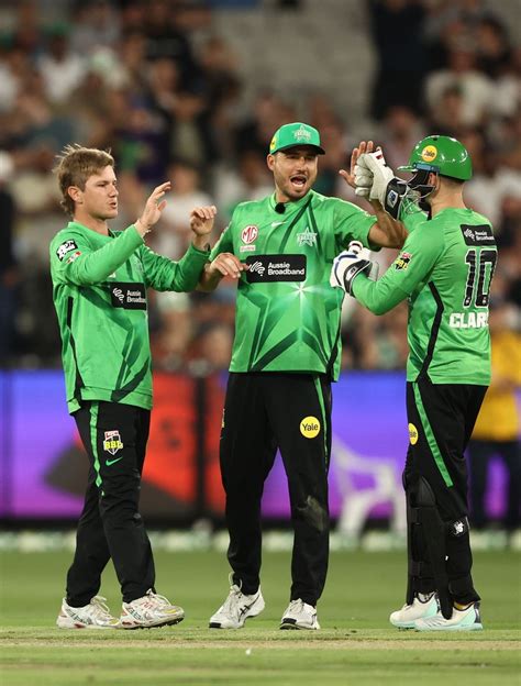 Adam Zampa celebrates dismissing Jason Sangha with Marcus Stoinis and ...