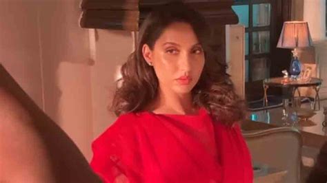 Nora Fatehi Strikes Killer Pose Looks Magnificent In A Red Saree Shares Video From Photoshoot