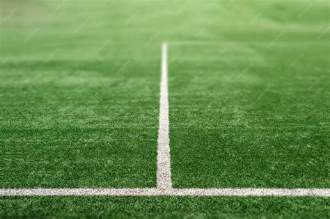 premium photo green sports field  artificial grass football