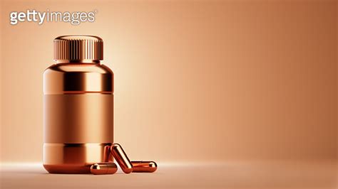 3d Rendering Of A Bronze Pill Bottle With Capsules 이미지 1331287190