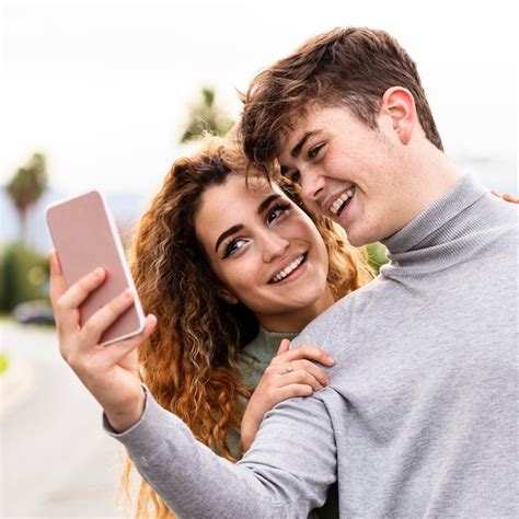 Free Photo Close Up Smiley Couple Taking Selfie