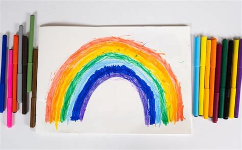 Premium Photo | Drawing of a 6 year old child a rainbow drawn with ...