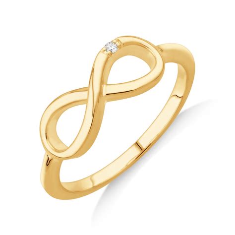 Diamond Accent Infinity Ring In 10kt Yellow Gold