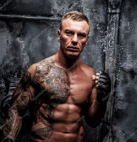 Muscular Strong Male With Tattoo Stock Photo Fxquadro 62585239