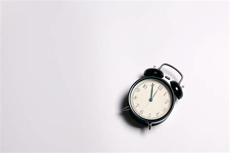 black alarm clock 11557527 Stock Photo at Vecteezy