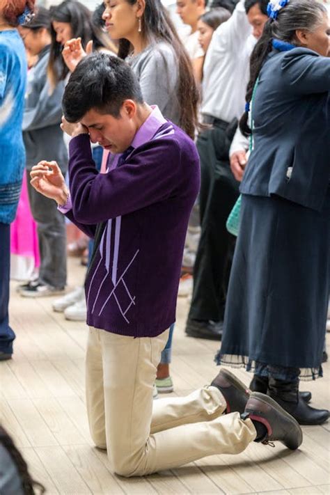 people kneeling worshipping christian