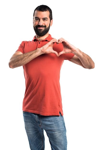 Free Photo Handsome Man Making A Heart With His Hands