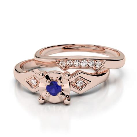 Gold And Platinum Round Cut Sapphire And Diamond Bridal Set Ring