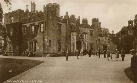 an old black and white photo of people walking in front of a large ...