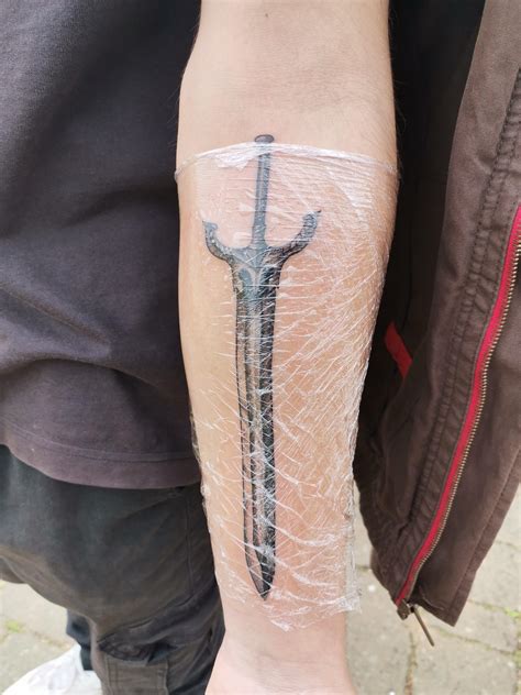 Black knight sword tattoo got my first one tattoo today : r/darksouls3