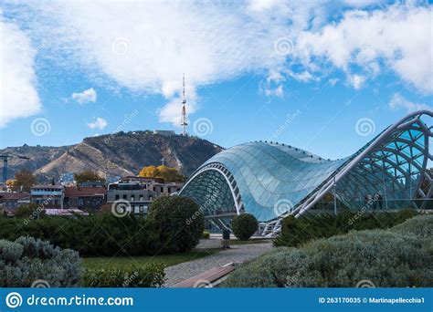 Tbilisi Georgia 05 10 2022 The Bridge Of Peace Is A Bow Shaped Pedestrian Bridge Over