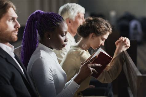 Group of people praying stock photo. Image of talking - 217104028