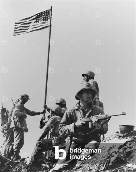 Image Of The First Flag Raising On Iwo Jimas Mount Suribachi Feb