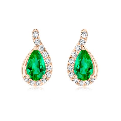 Pear Shaped Emerald Drop Earrings With Wave Diamond Accents Angara