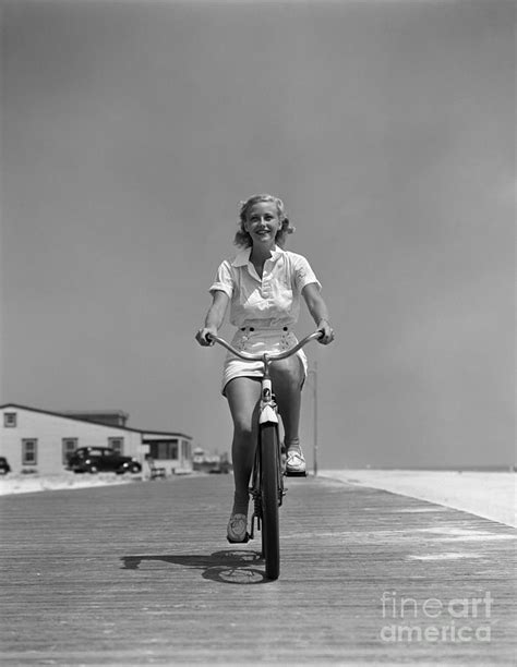 Woman Riding Bike On Boardwalk C 1940s Photograph By H Armstrong Roberts Classicstock Fine