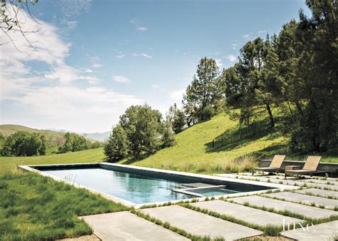 modern neutral poolside  grass  pavers luxe interiors design