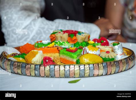 Sweets, cakes and desserts for Indian wedding reception Stock Photo - Alamy