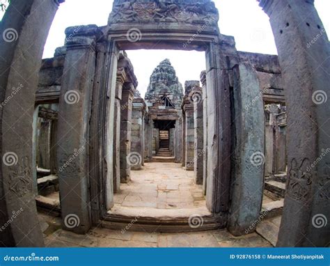 Enigmatic Giant Stone Faces Of Ancient Bayon Temple In Angkor Th Stock