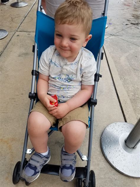 My not quite 2 year old squishing into an umbrella stroller.. : r