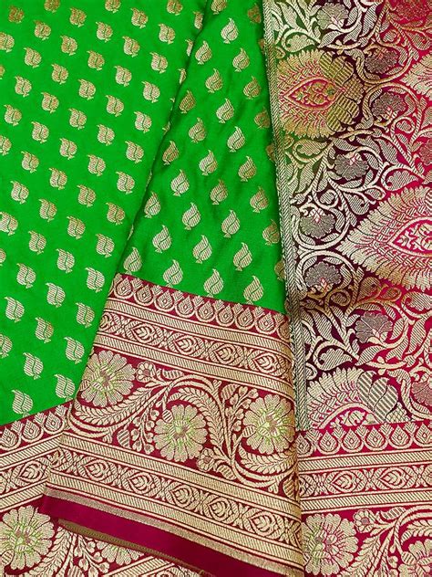 Satin Silk Banarasi Saree With Brocade Conch Motif And Bail Butta On