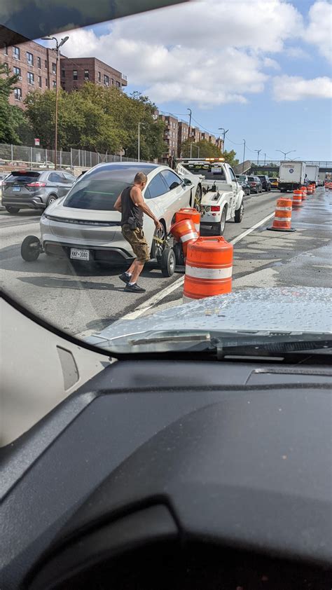 If this is your car and it has damages. It's absolutely the tow truck